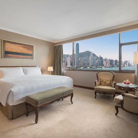 Marco Polo Hongkong Hotel Exterior photo A bedroom at the Mandarin Oriental, Hong Kong