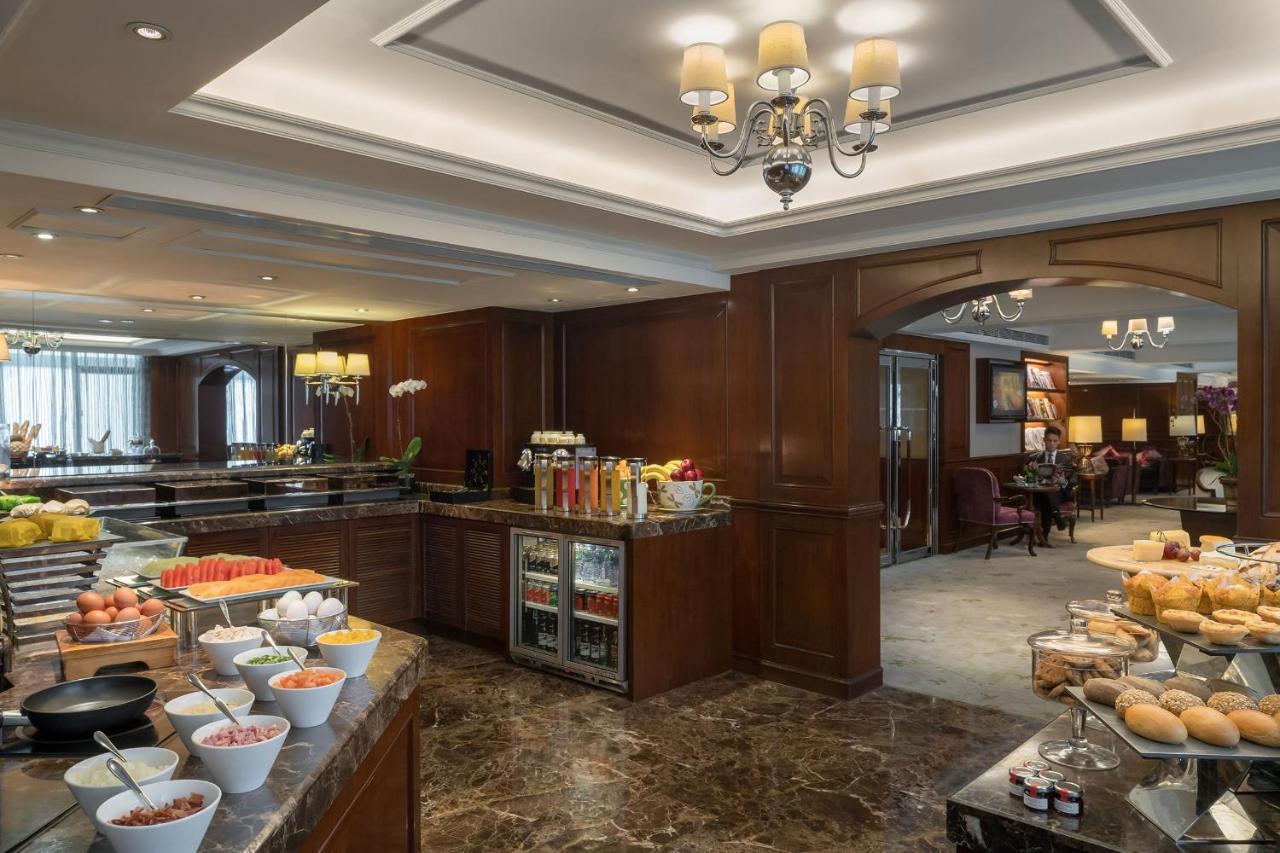 Marco Polo Hongkong Hotel Exterior photo The Club Lounge at the Hong Kong International Airport