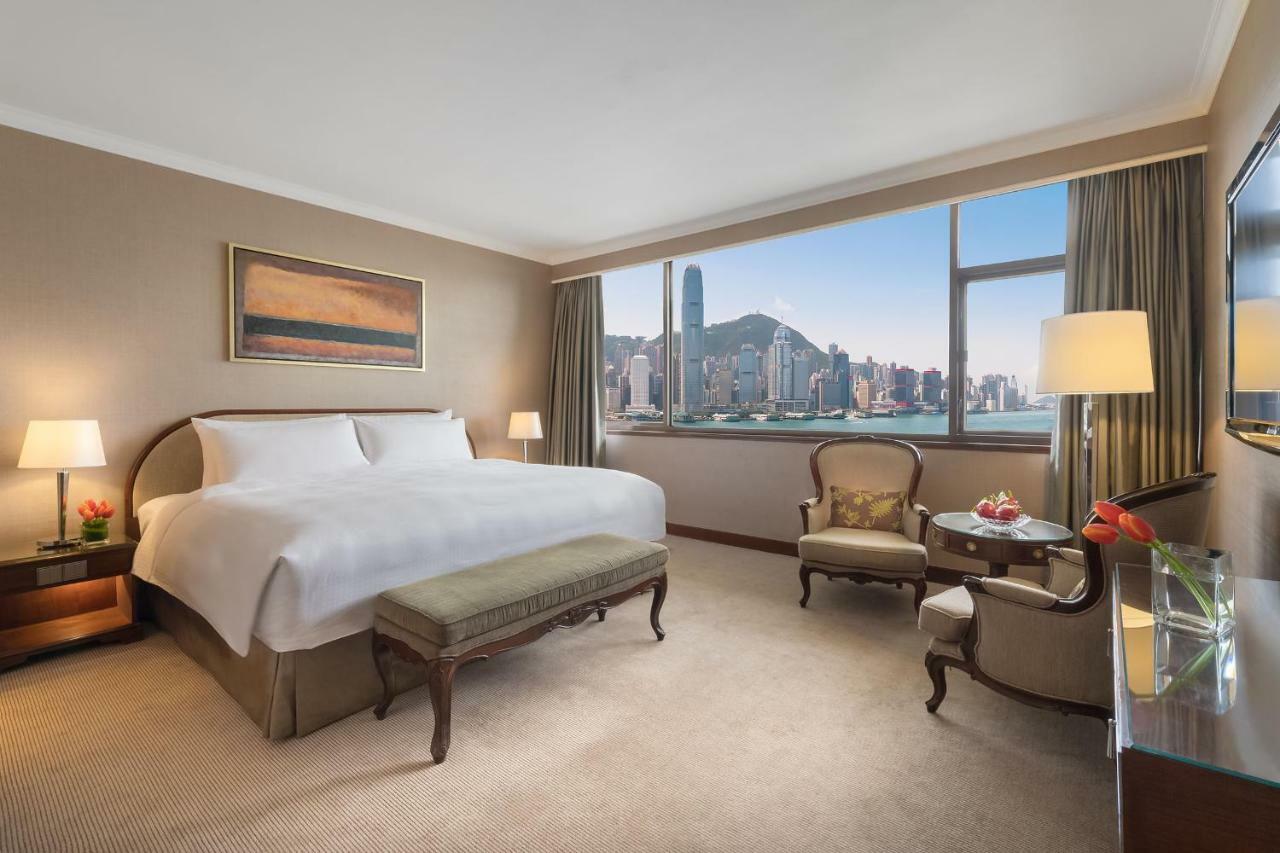 Marco Polo Hongkong Hotel Exterior photo A bedroom at the Mandarin Oriental, Hong Kong